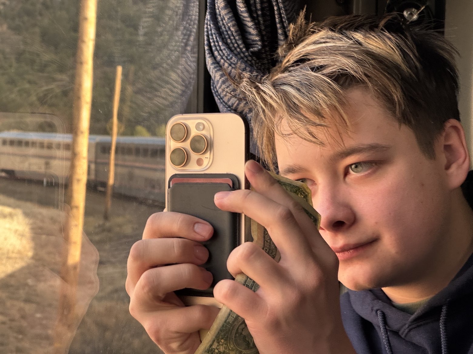 Erik photographing through the train window